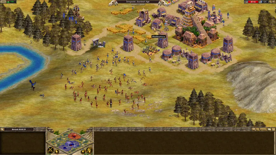 Rise of Nations: Extended Edition: two groups of soldiers fight in a field outside a town with towers and a stepped pyramid, beside a river